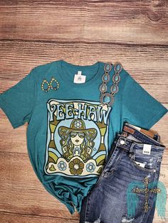 Feel confident and stylish in our Turquoise Yee Haw Cowgirl Tee. Made with a soft and breathable bella canvas fabric, this tee adds a pop of color to any outfit. Perfect for everyday wear or a night out. Yee Haw, Girls Purse, Dress Jewelry, Pop Of Color, Feel Confident, Dress Accessories, Special Events, Bella Canvas, Canvas Fabric