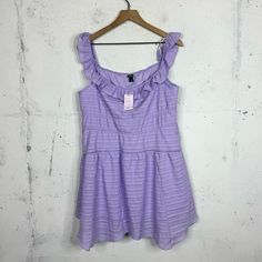 Brand: Wild Fable Size: Xl Condition: Brand New With Tags Material: Recylced Polyester Color: Purple/Lavender Fit: Ruffle Gauze Like Dress, Spring Dress, Tunic Top, Ruffle Sleeves, Flaws: None Purple Ruffled Sundress For Summer, Purple Ruffle Hem Mini Dress For Summer, Purple Sleeveless Ruffle Dress For Spring, Spring Purple Sundress With Ruffles, Summer Purple Ruffle Dress, Purple Cotton Mini Dress With Ruffles, Casual Purple Sundress With Ruffles, Casual Purple Ruffled Sundress, Printed Denim Dress