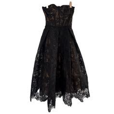 Quality Dress, No Noticeable Flaws. Black A-line Corset Dress For Formal Occasions, Evening Midi-length Strapless Lace Dress, Strapless Midi Lace Dress For Evening, Evening Strapless Midi Lace Dress, Evening Lace Strapless Midi Dress, Black Strapless Dress With Boned Bodice For Evening, Black Strapless Midi Dress For Gala, Strapless Black Lace Evening Dress, Black Midi Dress With Boned Bodice