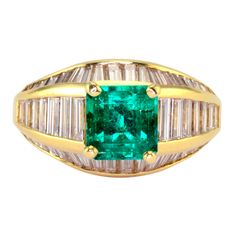 Estate 1.80 carat emerald and diamond ring. This 18 karat yellow gold ring has one square cut emerald at 1.80 carats and 50 baguette diamonds at 2.50 carat total weight VS1-2 clarity F-G color. The emerald ring is a size 6.5. This emerald diamond ring is appraised at $15,800. [KIMH 1847 P] *Resizing available for additional charge. Classic Green Diamond Ring With Baguette Diamonds, Formal Green Diamond Ring With Baguette Diamonds, Formal Yellow Gold Emerald Ring With Baguette Diamonds, Solvang Ca, Resize Ring, Emerald And Diamond Ring, Chic Rings, Emerald Gem, Emerald Diamond Ring