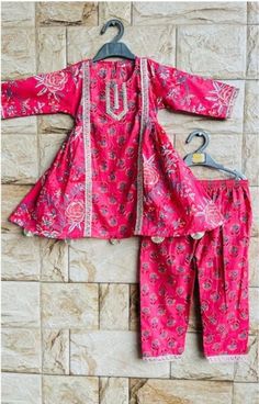 This exclusive Cotton Salwar kurta set is perfect for any occasion or function. It is a perfect combination of style, design and traditional wear Pink Cotton Sets For Festive Occasions, Bollywood Style Pink Cotton Palazzo Set, Pink Cotton Sets For Diwali, Pink Cotton Palazzo Set For Festivals, Pink Anarkali Pant Set For Festivals, Cotton Pant Set With Dupatta For Eid, Pink Cotton Sharara With Zari Work, Anarkali Cotton Pant Set With Dupatta, Cotton Sharara With Printed Motifs For Eid