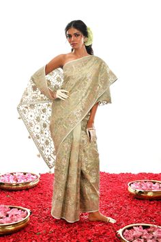 Designed to stand out from the crowd, this one-of-a-kind creation in Sage Green is a luxurious choice crafted with fine Gota Patti hand work on exquisite Organza silk. An exclusive piece, it radiates timeless elegance and looks stunning in any setting. Saree Look, Hand Work, Beautiful Saree, Craft Work, Blouse Piece, Sage Green, Work On, Silk Sarees, Timeless Elegance