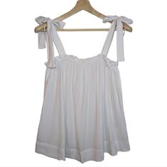 Nwt | H&M White Crop Top W|Bow Accent Straps - Straps Are Not Adjustable But Can Be Re-Tied. Size | Medium Overall Length | 26" Pit To Pit | 16" Waist | 27" Condition | Preowned, Never Worn. Nwt. H&m Tops For Summer Loungewear, White Tops With Adjustable Straps For Daywear, H&m Summer Loungewear Tops, White H&m Tops For Vacation, H&m White Tops For Vacation, White H&m Tops For The Beach, White Tops With Tie Straps For Daywear, H&m White Beach Top, White H&m Beach Top