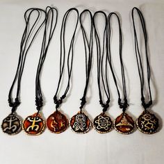 Double-sided Taino Symbols Adjustable Necklaces Assorted Adjustable Spiritual Jewelry, Brown Pendant Jewelry For The Beach, Brown Pendant Jewelry For Beach, Adjustable Medallion Jewelry For Festivals, Adjustable Brown Medallion Jewelry, Brown Jewelry With Adjustable Chain For Festival, Symbolic Handmade Adjustable Necklaces, Handmade Symbolic Adjustable Necklaces, Adjustable Symbolic Handmade Necklaces