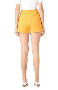 Sail into shorts season in this chic pair fastened with a double row of bold golden buttons for a polished, nautical-inspired look. Lined 97% polyester, 3% spandex Hand wash, dry flat Imported Chic High-waist Elastane Shorts, Chic High Waist Elastane Shorts, Chic Summer Elastane Skort, Chic Elastane Shorts With Short Inseam, Summer Elastane Short Skort, Summer Workwear Skort With Short Leg, High Waist Elastane Shorts For Summer, High Waist Stretch Shorts For Summer, Spring Elastane Shorts