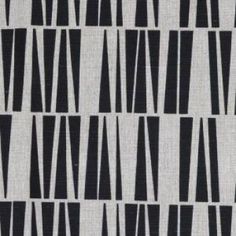 a black and white pattern on fabric with vertical lines in the center, as well as small squares