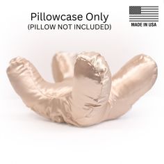 an image of a gold foiled object with the words pillowcase only below it