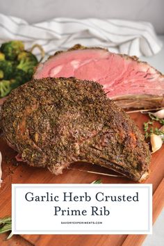 garlic herb crusted prime rib on a cutting board