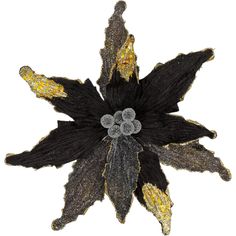 a black flower with gold and silver accents