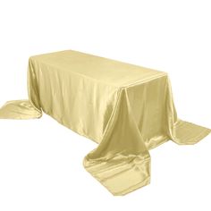 a table covered with a yellow cloth