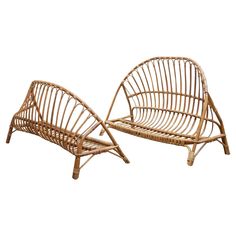 two wicker chairs sitting next to each other on a white background and one is empty