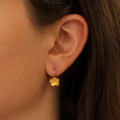 Little 3D flower drop earrings handmade in gold vermeil, with a hook fitting.  Dimensions: * Flower: 0.8cm  * Earring length: 2.3cm including hook  Materials: * Gold Vermeil  Also available in sterling silver: https://www.etsy.com/uk/listing/559855916 Beyond Biasa creates unique jewellery that is inspired by antique and tribal designs from around the globe. All of our pieces are handmade so please allow for slight variations in size and colour. Gold Flower Earrings, Flower Earrings Gold, Little Earrings, Flower Drop Earrings, Drop Earrings Gold, Sterling Silver Flowers, Gold Flower, Contemporary Jewellery, Gold Drop Earrings