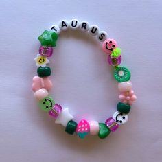 Handmade Kandi Astrology Zodiac Taurus Beaded Friendship Bracelet Great gift for friends, family, or yourself.💗🥰 ♉️ Novelty Colorful Beaded Bracelets As Gifts, Novelty Birthday Beaded Bracelets, Handmade Novelty Beaded Bracelets For Birthday, Handmade Novelty Beaded Bracelets For Birthdays, Handmade Green Novelty Beaded Bracelets, Handmade Green Beaded Novelty Bracelet, Handmade Green Novelty Beaded Bracelet, Handmade Symbolic Beaded Bracelets For Friendship, Casual Beaded Bracelets For Birthday