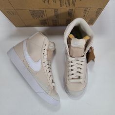 Brand: Nike Style: Blazer Mid '77 Next Nature Sneakers Color: Light Orewood Brown/White Condition: New In Box, Box Is Missing Lid. See All Photos For Details. Size: Women's 5.0 / Men's 3.5 -Synthetic Leather Upper Is Free Of Animal Ingredients -At Least 20% Recycled Materials By Weight -Non-Marking Rubber Sole Nike Cream Mid-top Sneakers, Nike Cream Skate Shoes With Gum Sole, Nike Cream High-top Sneakers With Cushioned Footbed, Nike Cream High-top Sneakers, Nike Beige High-top Sneakers, Nike Casual Cream Skate Shoes, Beige Nike High-top Sneakers, Cream High-top Skate Shoes With Laces, Nike Cream High-top Sneakers With Gum Sole