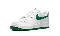 The Nike Air Force 1 Low “Malachite” is a colorway of the retro basketball shoe with green accenting.  The Air Force 1 Low “Malachite” features a white leather construction with Malachite leather Swoosh branding on either side.  More Malachite accenting can be found on the leather heel tab with “Nike Air” branding, and on the “Nike Air Force 1” detailing on the tongue tag.  Rounding out the look, a green “Air” logo appears on the heel of white midsole.  Release date: December 12, 2023 White And Green Air Force 1, Nike Air Force 1 Green And White, Nike Air Force Green, White And Green Shoes, Nike Air Force 1 Green, Air Force Green, Green Air Force 1, Green Nike Shoes, Air Logo