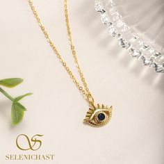 Eye-catching and elegant. A unique gold chain necklace with an amazing celestial gold pendant featuring evil eye with clear lashes. Have sapphire blue CZ set into the evil eye charm, it dazzles in the lights, accentuating the beauty of your skin and making you sparkly at any parities. Unique Gold Chain, Astrology Jewelry, Simple Gift Wrapping, Prom Jewelry, Simple Gifts, Evil Eye Charm, Sapphire Blue, Gold Chain Necklace, Sapphire Diamond