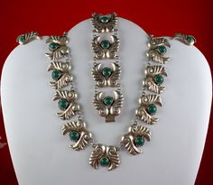 Rare vintage Mexico sterling silver ferns with malachite stones Demi parure set, Necklace, bracelet, and screw back earrings.  Unmarked as to the maker, resembles works by some of the well known artists of its time necklace is short, 14 inches overall but this one could easily be made longer with round links added weight of the necklace is 50 grams, each element is 1-1/8" long by 1 inch tall bezel set green jadeite stones in all the pieces the linear length of the bracelet is 7-1/2" long, it wou Silver Engraved Art Deco Jewelry, Art Deco Engraved Silver Jewelry, Green Sterling Silver Art Deco Jewelry, Vintage Hallmarked Emerald Jewelry, Silver Art Deco Hallmarked Jewelry, Art Deco Hallmarked Silver Jewelry, Engraved Round Costume Jewelry, Antique Green Jewelry With Polished Finish, Sterling Silver Art Deco Jewelry With Polished Finish