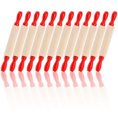 eight red toothbrushes lined up in a row