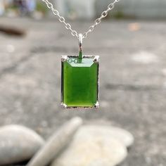 This Jade Necklace has a Natural Nephrite Jade Pendant. People believe that Green Stone Necklace is considered a necklace of luck. The Jade Necklace Silver is a suitable gift for a girl, a boy, or your best friend. Product Description - Gemstone: Natural Canadian Nephrite - Stone size: 9mm x 13.5mm x 4.5mm - Material: S925 Silver - Color: Light Green to Green. - Chain length: 18" - 20" adjustable (leave me a note if you need a longer chain). Jade Nephrite is a stone with a heart of healing, and Green Amulet Jewelry As A Gift, Jade Amulet Pendant Necklace, Green Amulet Pendant Necklace, Spiritual Rectangular Jade Jewelry, Jade Pendant Necklaces For Crafting, Green Amulet Pendant Crystal Necklace, Green Amulet Crystal Pendant Necklace, Green Pendant Crystal Amulet Necklace, Green Jade Spiritual Necklace