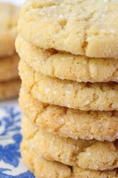 a stack of cookies sitting on top of a blue and white plate