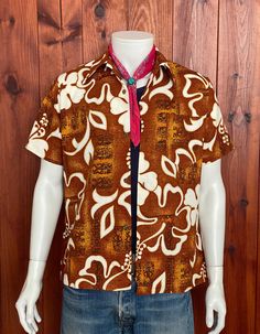 FAST SHIPPING WITH UPS. Tracking number will be sent to you. Description: Beautiful Vintage 60s Hawaiian shirt 100% cotton. Made in Hawaii. Condition. Very Good. Marked size: Medium, but please always refer to measurements. A: pit to pit : 55 cm B: length from back neck seam to bottom back hem: 71cm C: Length from neck seam to sleeve hem: cm D: length from shoulder seam to shoulder seam: 45cm *See last picture for details. *Please view all Detailed Pictures of the item up for offer for exact con Retro Brown Cotton Camp Shirt, Brown Printed Cotton Shirt, Cotton Retro Shirt With Retro Print, Cotton Shirt With Retro Print, Retro Brown Cotton Shirt, Cotton Hawaiian Shirt With Retro Print And Camp Collar, Cotton Camp Shirt With Retro Print, Retro Cotton Hawaiian Shirt With Vintage Print, Hawaiian Shirt With Vintage Print In Cotton