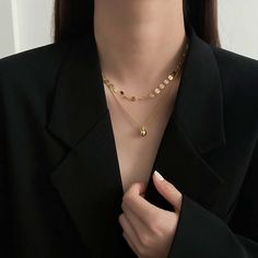 ✦ Simplicity meets elegance with our Simple Gold Ball Pendant Necklace. The minimalist design of this necklace showcases a sleek and polished ball pendant suspended from a two-strand chain. The gold color adds a touch of warmth and sophistication to your neckline. Whether you're layering it with other necklaces or wearing it on its own, this versatile piece is a must-have in your jewelry collection. Effortlessly stylish and timeless, it's perfect for any occasion and complements a wide range of Gold Ball Pendant, Ball Pendant Necklace, Elegant Gothic, Basic Jewelry, Nose Rings Hoop, Crystal Hoop Earrings, Gold Disc, Of Outfits, Ball Pendant