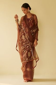 Brown organza silk saree with floral hand embroidery. Comes with a velvet silk unstitched blouse piece. - Aza Fashions Transitional Embroidered Organza Pre-draped Saree, Festive Pre-draped Cotton Silk Saree With Intricate Embroidery, Designer Organza Pre-draped Saree For Festivals, Bollywood Organza Pre-draped Saree For Eid, Festive Organza Pre-draped Saree With Pallu, Festive Organza Blouse Piece, Transitional Organza Blouse With Intricate Embroidery, Anarkali Style Pre-draped Organza Saree For Eid, Transitional Season Silk Saree With Intricate Embroidery