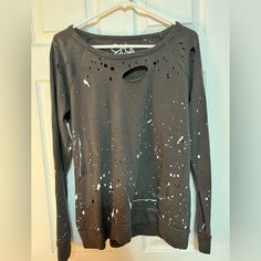 Sweatshirt Is So Cute! Has Paint Splatters And Hole Distressing. Never Worn, But Doesn’t Have Tags On It. Runs A Little Big. Ripped Grunge Tops For Fall, Edgy Ripped Tops For Fall, Casual Relaxed Fit Tops With Paint Splatter, Casual Paint Splatter Tops Relaxed Fit, Ripped Long Sleeve Tops For Streetwear, Trendy Black Distressed Sweatshirt, Casual Spring Tops With Paint Splatter, Casual Paint Splatter Top For Spring, Paint Splattered Cotton Crew Neck Tops