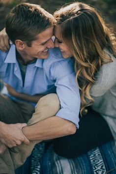 a man and woman sitting next to each other