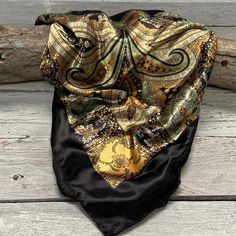 Exquisite mixtures of yellows and greens come together to form this alluring floral paisley pattern. The black background and boarder allow each and every color to stand out. Measures 35" and is a perfect square.100% machine washable polyester, silky and soft. Black Bohemian Scarves With Bandana Print, Western Scarf, Outfit Western, Rodeo Events, Solid Black Background, Golden Rod, Wild Rag, Perfect Squares, Shades Of Yellow