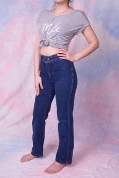 Description and item condition:Own a piece of 70's flare with these Wrangler Jeans. High waist, straight leg, and a snap button closure. Sizing & Measurements:Size: 25"Measurements:Waist: 25"Hip: 34"If you have any more questions, please ask and I'll be happy to answer! 70s Inspired Fitted Straight Leg Jeans, Retro Bottoms With Button Closure, Retro Wide Leg Jeans With Button Closure, Retro High Rise Flare Jeans With Button Closure, 90s Fitted Bottoms With Button Closure, Vintage Fitted Jeans With Button Closure, Vintage Mid-rise Jeans With Buttons, Retro Straight Leg Bottoms With Button Closure, Fitted Retro Medium Wash Pants