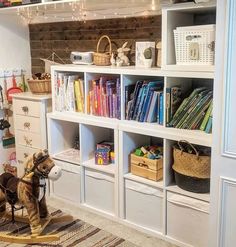 there is a toy horse and some books on the shelves