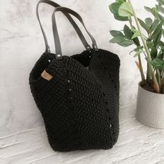 Large shopping bag, Scandinavian style, Crochet purse, shopping net with handles made of eco leather. Stylish, roomy, soft and cozy crochet handbag for those who love comfortable things! Size: height; 11.8 inch (30cm) (total height 23.2 inch (59cm)) width; 16.5Inch (42cm) depth; 11Inch (28cm) Color: black Material; cotton string A classic handbag - for women who appreciate timeless fashion accessories. High-quality handbag perfect for everyday use or for special occasions. It can also be a great gift ... Please note this item is handmade, so there may be 0.4-0.8 inch cm (1-2 cm) measurement difference. In case of constant exposure to sunlight outside, it does not change color. Please note that colors may vary due to computer settings, monitor calibration, differences in cell phone screens Chic Crochet Shoulder Bag With Large Capacity, Black Crochet Bag With Large Capacity For Everyday Use, Casual Black Crochet Bag With Large Capacity, Black Large Capacity Handheld Crochet Bag, Black Crochet Shoulder Bag With Top Carry Handle, Quality Handbags, Classic Handbags, Cotton String, Crochet Purses