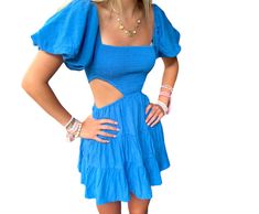 The sweet Caroline cut out dress with puff sleeves in ocean blue color. Casual Dresses With Cut-out Waist For Day Out, Casual Dress With Cut-out Waist For Day Out, Casual Cut-out Waist Dress For Day Out, Summer Beach Mini Dress With Gathered Sleeves, Trendy Puff Sleeve Mini Dress For Vacation, Casual Fitted Dress With Cut-out Waist, Chic Puff Sleeve Mini Dress For Beach, Chic Beach Mini Dress With Gathered Sleeves, Blue Puff Sleeve Dress With Gathered Sleeves For Spring