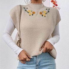 Floral Embroidered Mock Neck Sweater Vest (White Top Not Included) White Floral Embroidery Sweater For Spring, White Sweater With Floral Embroidery For Spring, White Floral Embroidery Sweater For Winter, White Floral Embroidery Winter Sweater, White Winter Sweater With Floral Embroidery, White Casual Sweater With Floral Embroidery, White Sweater With Floral Embroidery, Knit Tops With Floral Embroidery For Fall, Floral Embroidery Knit Tops For Fall