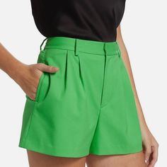 These Are As Show-Stopping As A Short Gets. The Tailored Fit Includes Front Pleats And A Cuffed Hem To Keep Things Polished. Pair With Tees Or Sweaters, You'll Look Chic Either Way. High-waisted Green Shorts For Work, Green High-waisted Shorts For Work, Green Short Bottoms For Work, Green Bottoms With Short Inseam For Workwear, Green Shorts For Workwear In Spring, Green High-waisted Shorts, Elegant Short Green Bottoms, Chic Green Bottoms With Short Legs, Chic Green Short Leg Bottoms