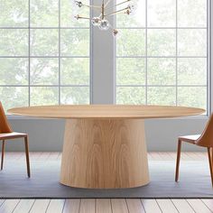 a round wooden table with two chairs around it in front of a large window that looks out onto the trees outside