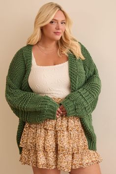 This cozy cardigan features a chunky cable knit for a classic, textured look. The thick, warm fabric makes it perfect for layering on chilly days. Cozy Warm Cardigan, White Dress Boots, Warm Fabric, Warm Cardigan, Chunky Cable Knit, Skirts With Boots, Chunky Knit Cardigan, Cozy Cardigan, Dress With Boots