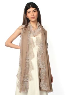 Woven from a very fine cashmere, this taupe scarf is lined with contrasting ivory pearl embroideredy on tonal taupe organza panels with scallopped edging on the long sides and wispy eyelash finges on the short ends. A very unique style that can add the glam factor to any outfit - day or night - year-round. Soft, chic and cozily warm, a must-have for any discering woman. Wispy Eyelashes, Ivory Pearl, Gold Threads, Cashmere Scarf, Borders, Unique Style, Cashmere, Unique Designs, Marseille