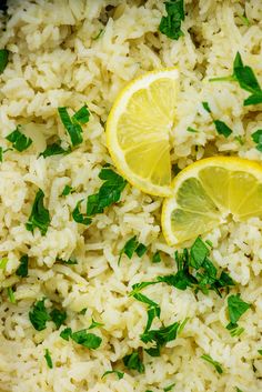 rice with lemon slices and herbs on top