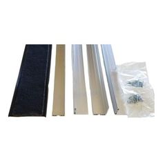 four different types of window frames in plastic bags and one with screws on it