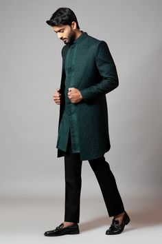 Emerald green straight-cut sherwani with honeycomb motif all-over cutdana work. Comes with short kurta and slim fit contrast trousers.
Component: 3
Embroidered
Neckline: Mandarin Collar
Sleeve Length: Sherwani: Full
Fabric: Sherwani: Suiting; Kurta: Linen; Trousers: Suiting
Color: Green
Concealed placket kurta
Seam pockets - Aza Fashions Green Unstitched Suit With Dabka Work For Formal Occasions, Formal Green Kurta With Dupatta, Green Bandhgala With Dabka Work And Traditional Drape, Elegant Green Semi-formal Kurta, Green Sherwani With Dabka For Eid, Unstitched Green Formal Suit, Green Sherwani With Embroidery For Eid, Green Dabka Sherwani For Eid, Fitted Green Sherwani With Dupatta