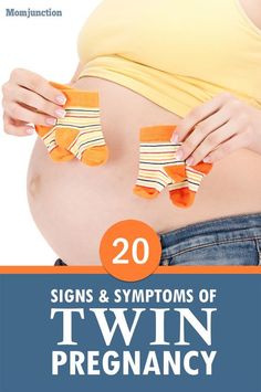 a pregnant woman holding two socks with the words 20 signs and symptoms of twin pregnancy