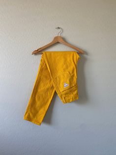 "Stunning yellow-colored vintage high-waisted Palmetto jeans from the 80s with standard zip fly and pockets. In good vintage condition. Measurements taken while item is laid flat. Measurements: waist: 24\" hips: 26\" length: 40\" inseam: 29.5\" rise: 11\" Tag size: 7 Fabric: 100% Cotton Made in USA" High Waisted Jeans Vintage, Surprise Az, Monochrome Outfit, Vintage Calvin Klein, Vintage Levis Jeans, Cute Tank Tops, Vintage Fits, Jan 11, Womens Jeans