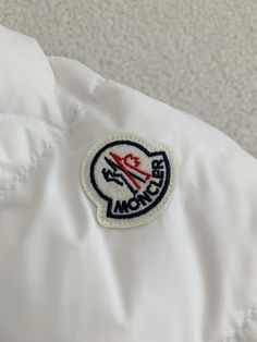 Experience the epitome of alpine luxury with this Moncler Cardere-inspired quilted down jacket. Crafted in a natural off-white hue, this jacket exudes sophistication and timeless style. The premium down filling provides exceptional warmth and comfort, while the quilted design and stand-up collar add a touch of refined elegance. Whether hitting the slopes or braving the city streets, this jacket is the perfect blend of fashion and function. Order your normal size, and we'll reach out to you via e Fall Winter Jacket, White Quilt, City Streets, Timeless Style, Down Jacket, Stand Up, Sneaker Boots, Timeless Fashion, The City