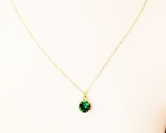 Emerald necklace, emerald pendant necklace, emerald jewelry, simple green necklace, minimalist neckl Dainty 14k Gold Emerald Necklace, Delicate Green Charm Necklaces With Delicate Chain, Dainty Green Charm Necklace With Round Pendant, Minimalist Green Charm Necklace For Everyday Wear, Green Minimalist Charm Necklace For Everyday, Minimalist Green Charm Necklace For Everyday, Minimalist Green Pendant Birthstone Necklace, Dainty Green Birthstone Necklace For Everyday, Green Pendant Birthstone Necklace Dainty Style