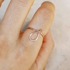 Delicate details make our Initial Ring in Silver a gorgeous addition to your finger! This beautiful piece is slim and trim, with a sweet cursive letter that lets you express yourself and to wear one on top of the other that make your look even more intriguing. This unique ring is made with gorgeous Sterling Silver for a beautiful shine that lasts. • Material: High Quality Sterling Silver 925, Gold Filled 12k, Rose Gold 12k• This ring is adjustable (you will receive it in the standard size US7, i Adjustable Simple Rose Gold Midi Rings, Simple Adjustable Rose Gold Midi Rings, Simple Adjustable Initial Ring, Dainty Adjustable Rose Gold Initial Ring, Rose Gold Simple Midi Rings, Trendy Rose Gold Stackable Rings As Gift, Adjustable Trendy Rose Gold Midi Rings, J Ring, Personalized Initial Ring