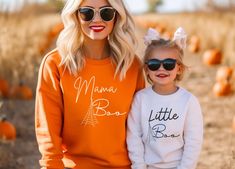 This mommy and me matching Halloween sweatshirt is the perfect way to coordinate all your little ghosts and gouls this season or get one just for you. Whether it's for Trecking trick or treaters or a casual Halloween event this sweater is cozy and universal. ideal for any situation, a unisex heavy blend crewneck sweatshirt is pure comfort. These garments are made from polyester and cotton. This combination helps designs come out looking fresh and beautiful. The collar is ribbed knit, so it retains its shape even after washing. There are no itchy side seams on these sweaters.  * 50% cotton, 50% polyester * Medium-heavy fabric (8.0 oz/yd² (271.25 g/m * Loose fit * Sewn-in label * Runs true to size You can find the matching baby body suit in our shop or at this link: https://ladybugdreambouti Mommy And Me Fall Shirts, White Family Matching Sweatshirt For Fall, Family Matching Cotton Sweatshirt For Fall, Matching Cotton Sweatshirt For Fall, Cotton Fall Sweatshirt, Fall Crew Neck Sweatshirt, Halloween Sweater Outfit, Casual Halloween, Trick Or Treaters