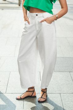 Slip into the White Woven Barrel Leg Pants for effortless style and comfort. From meetings to errands, they'll keep you looking and feeling fabulous. Product code: CAA02D4D013CC Features:  Woven Zip fly with button closure Pockets Barrel leg Wash Method: Regular Wash Material: 100%COTTON. Chic Baggy Wide Leg Bottoms, Trendy Baggy Bottoms With Button Closure, Baggy High Waist Bottoms For Day Out, Versatile Baggy Bottoms For Spring, Relaxed Fit Ankle-length Bottoms For Day Out, Chic Baggy Ankle-length Pants, Baggy Wide Leg Bottoms For Day Out, Trendy Business Casual Bottoms With Button Closure, Versatile Cotton Pants For Day Out