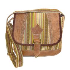 Aza Buffalo Leather & Cotton Bag Nepali bag made with woven cotton and buffalo leather. Each bag's material is cut and applied differently for a one-of-a-kind statement piece. Cotton fabric Superior stitching to ensure years of use Long adjustable shoulder strap One internal pocket with zip close Like this bag? Check out the rest of our bag collection! Beige Handwoven Leather Bag, Casual Handwoven Leather Bag, Woven Leather Bags For Everyday Use, Everyday Leather Woven Bag, Brown Satchel With Adjustable Strap For Trips, Daily Use Crossbody Shoulder Bag With Leather Trim, Crossbody Shoulder Bag With Leather Trim For Daily Use, Brown Handwoven Leather Hobo Bag, Brown Leather Handwoven Hobo Bag